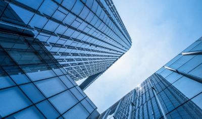 view looking up at office buildings, Cloud Platforms | DXC Technology Insights